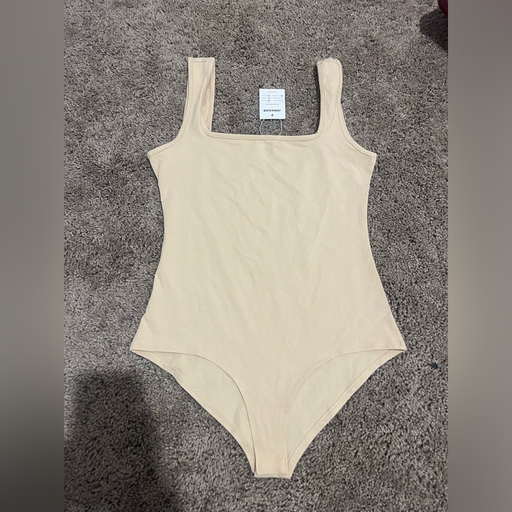 Bodysuit NEW size Small 
New with tag 
Brand Jorasob